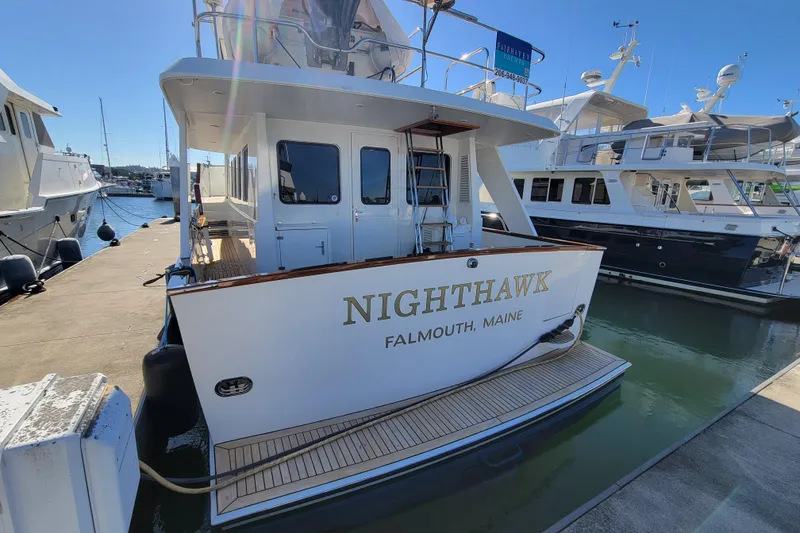 Slide: The Image of Lyman-Morse 1999 pilothouse yacht "Nighthawk" docked in Falmouth, Maine marina. - 4