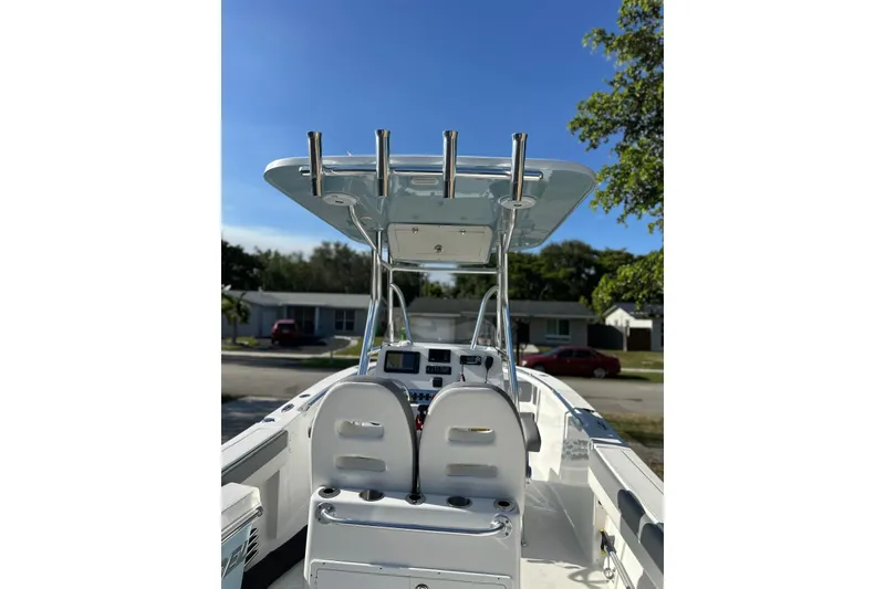 Slide: The Image of 2019 Release 240 RX boat interior with dual seats and navigation equipment. - 19