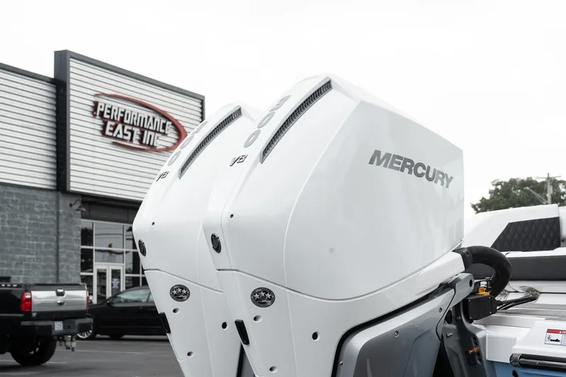 Slide: The Image of Twin Mercury outboard engines on a 2026 Monterey Elite 30 OB at Performance East Inc. - 7