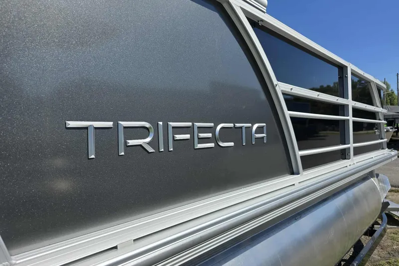 Slide: The Image of 2026 Trifecta 22RFLE275 pontoon boat with sleek metallic finish. - 3