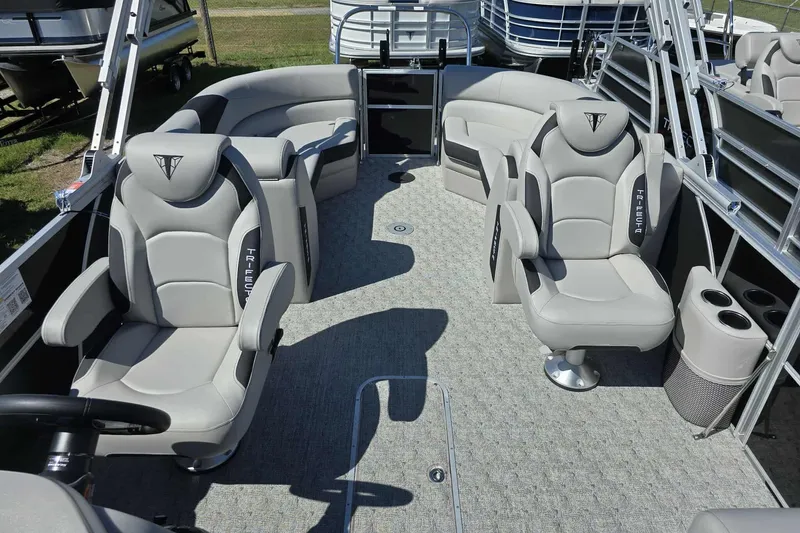 Slide: The Image of 2026 Trifecta 22RFLE275 pontoon boat interior with plush seating and modern design. - 6