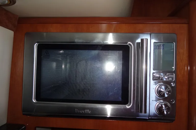 Slide: The Image of Stainless steel Breville microwave in a 2007 Meridian 459 yacht kitchen. - 100