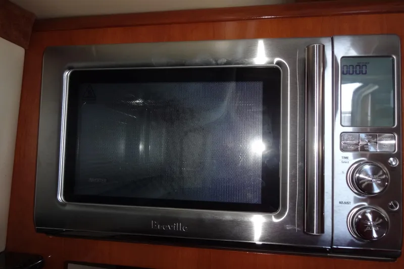 Slide: The Image of Stainless steel Breville microwave in a 2007 Meridian 459 yacht kitchen. - 101