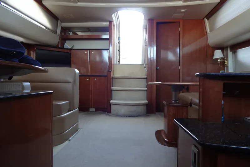 Slide: The Image of Luxurious interior of a 2007 Meridian 459 yacht with elegant wood finishes. - 110
