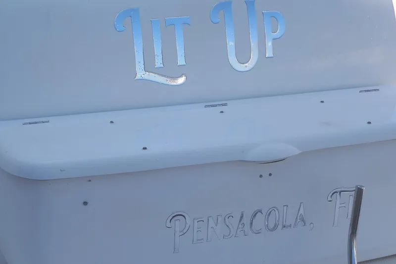 Slide: The Image of 2007 Meridian 459 boat with "Lit Up" text, Pensacola, FL. - 12