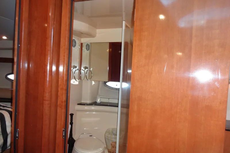 Slide: The Image of Luxurious bathroom interior of 2007 Meridian 459 yacht with wooden finishes. - 122
