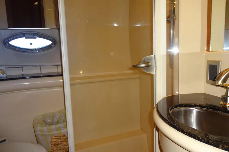 Slide: The Image of Bathroom interior of 2007 Meridian 459 yacht with shower and sink. - 125