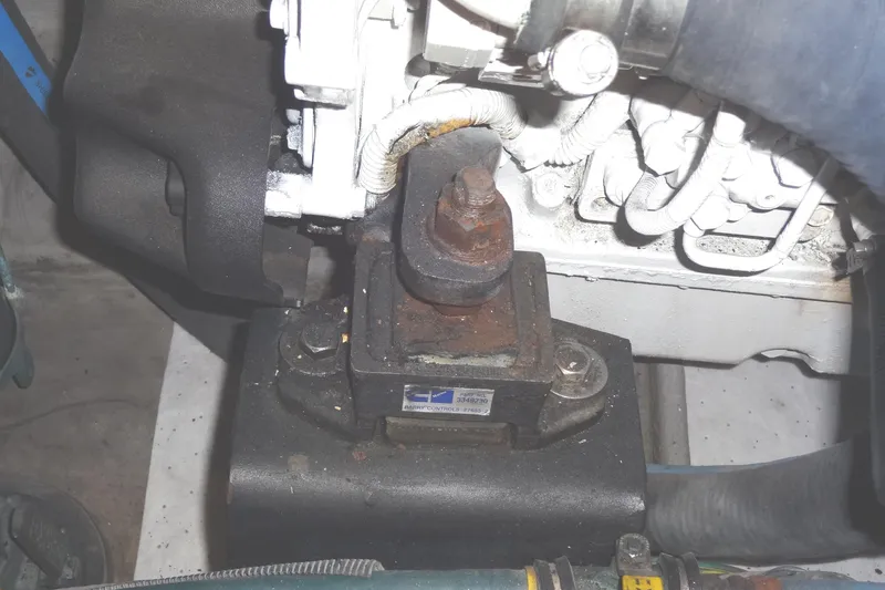 Slide: The Image of Engine component of a 2007 Meridian 459, showing mounting and wiring details. - 149