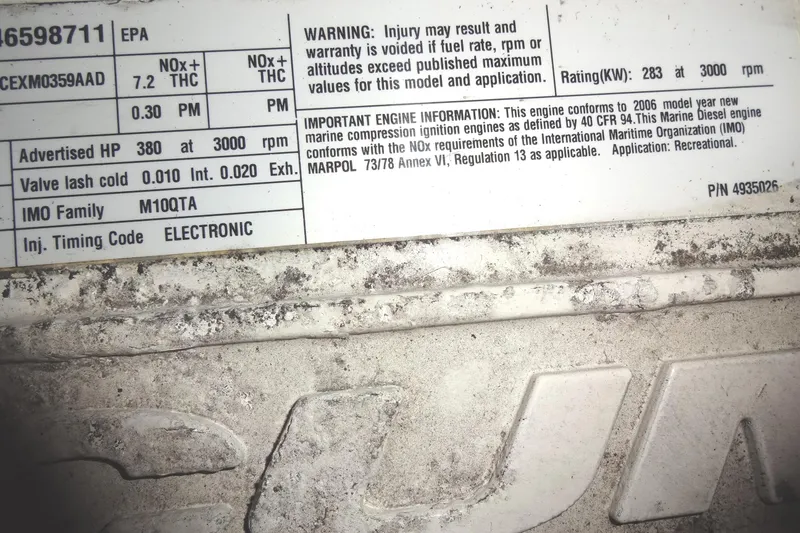 Slide: The Image of ```json { "alt_text": "Meridian 459 engine specifications label, 2007 model, showing technical details and warnings." } ``` - 153