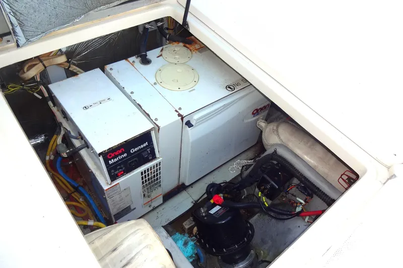 Slide: The Image of Engine room of 2007 Meridian 459 yacht with Onan marine generator. - 163