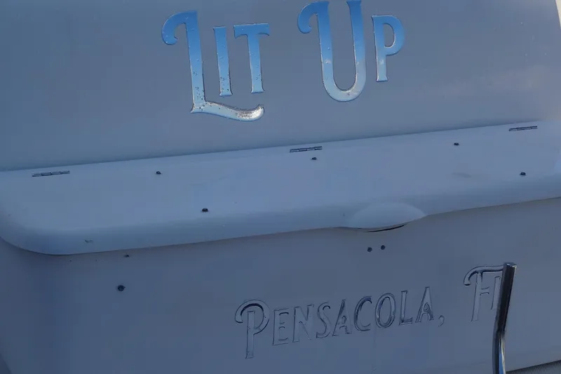 Slide: The Image of 2007 Meridian 459 boat with "Lit Up" name, docked in Pensacola, Florida. - 165