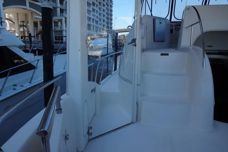 Slide: The Image of 2007 Meridian 459 yacht interior with stairs and marina view. - 33