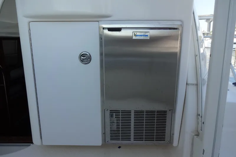 Slide: The Image of 2007 Meridian 459 yacht with stainless steel Raritan ice maker on deck. - 37