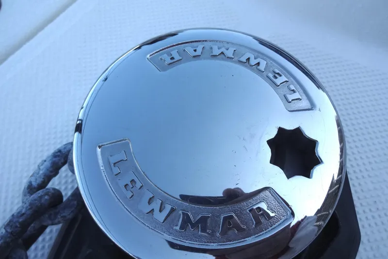 Slide: The Image of Chrome Lewmar winch on a 2007 Meridian 459 yacht deck. - 43