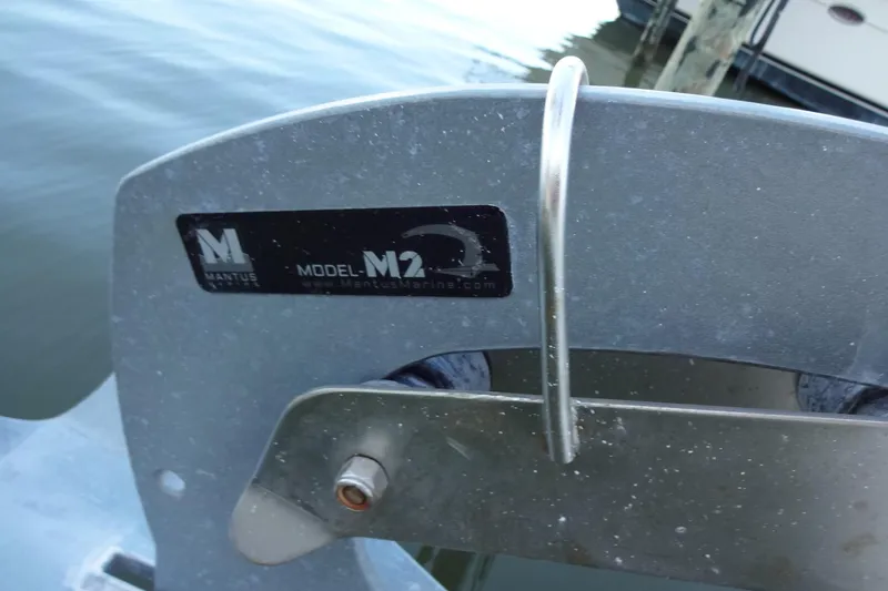 Slide: The Image of Mantus Marine M2 anchor on a 2007 Meridian 459 yacht, docked by the water. - 45