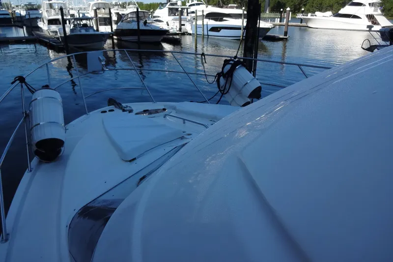 Slide: The Image of 2007 Meridian 459 yacht docked at marina with other boats in background. - 48