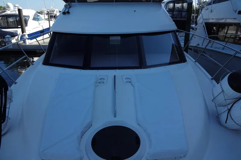 Slide: The Image of 2007 Meridian 459 yacht docked at marina, front deck view. - 51