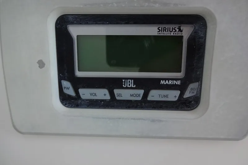 Slide: The Image of JBL Marine radio control panel on 2007 Meridian 459 with Sirius Satellite Radio. - 59