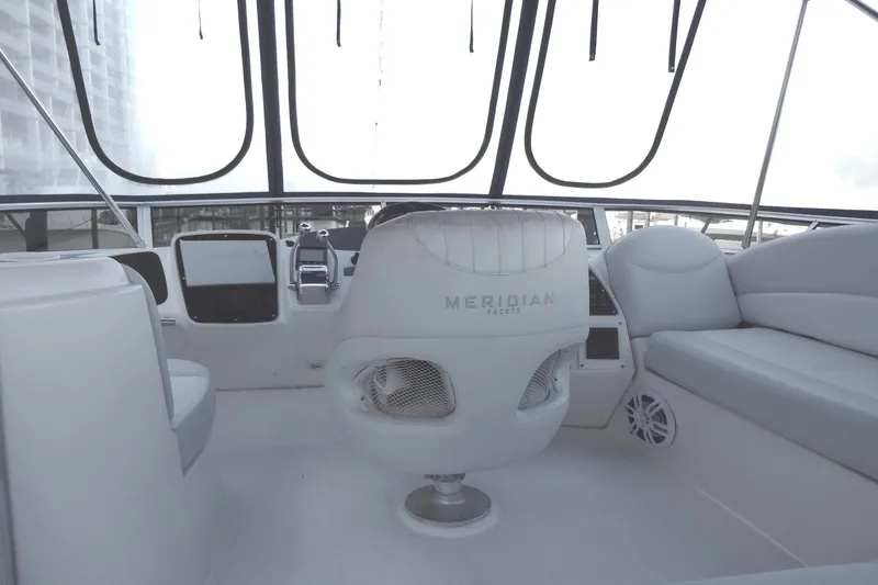Slide: The Image of Interior of a 2007 Meridian 459 yacht with modern helm and seating. - 62