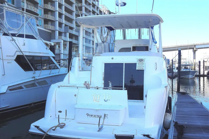 Slide: The Image of 2007 Meridian 459 yacht docked at marina office in Orange Beach, Alabama. Lit Up home port is Pensacola, Florida. Lit Up has been moved for your convenience and viewing pleasure - 7