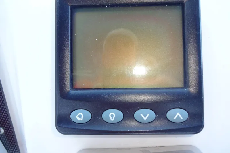 Slide: The Image of Control panel of a 2007 Meridian 459 boat with navigation buttons. - 71