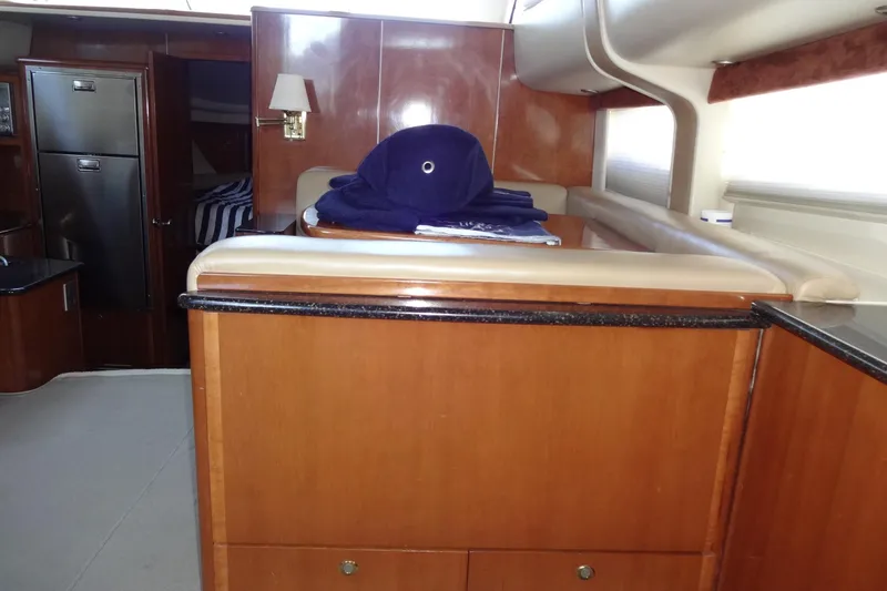 Slide: The Image of Interior of 2007 Meridian 459 yacht with wood paneling and modern amenities. - 92