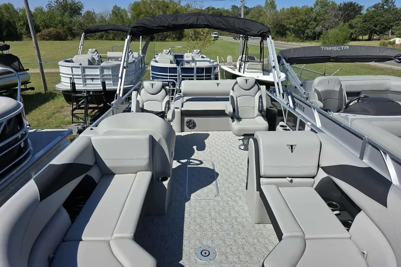 Slide: The Image of 2026 Trifecta 24ULLET275 pontoon boat with spacious seating and modern design. - 5
