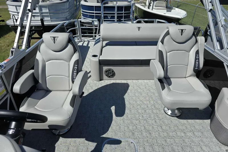 Slide: The Image of 2026 Trifecta 24ULLET275 boat interior with luxurious seating and modern design. - 6
