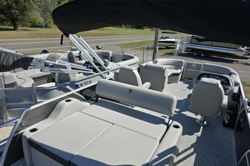 Slide: The Image of 2026 Trifecta 24ULLET275 pontoon boat with spacious seating and modern design. - 8