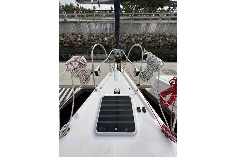 Slide: The Image of Deck view of a 2008 Hunter 49 sailboat with ropes and hatch. - 16
