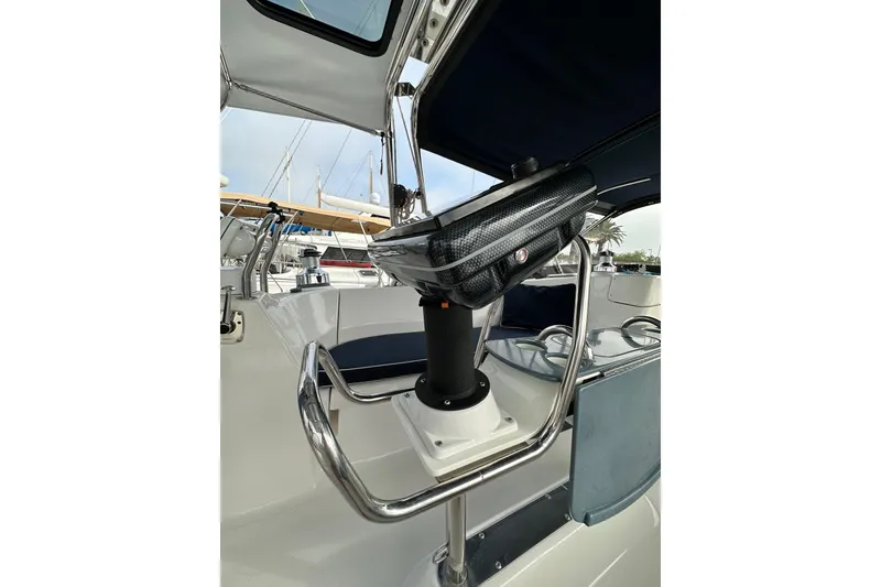 Slide: The Image of Steering area of a 2008 Hunter 49 yacht with chrome details and seating. - 40