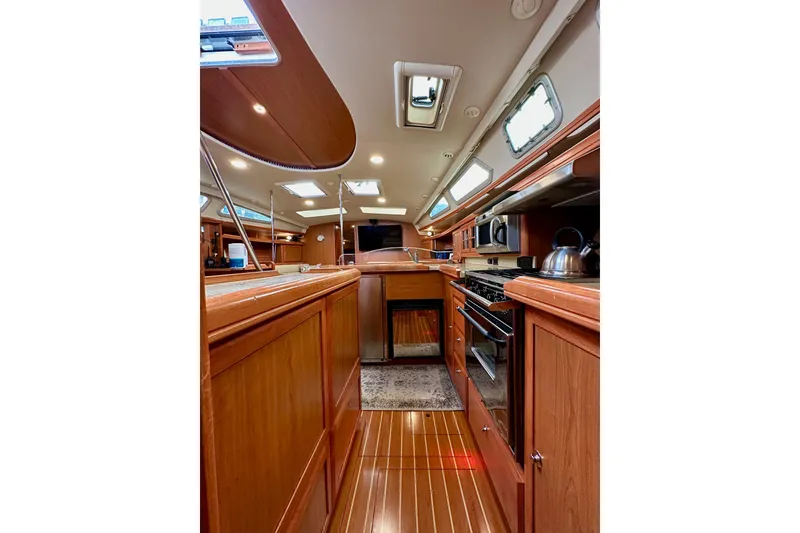 Slide: The Image of Luxurious interior of 2008 Hunter 49 yacht with modern kitchen amenities. - 67