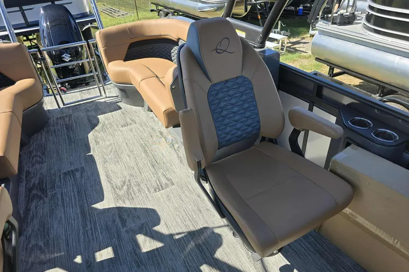Slide: The Image of Luxurious interior of 2026 Qwest 22RLS boat with plush seating and modern design. - 7