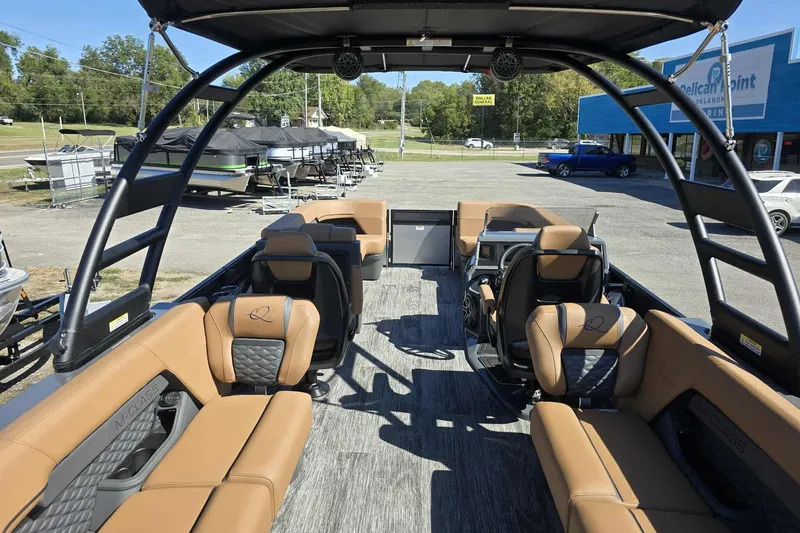 Slide: The Image of 2026 Qwest 22RLS pontoon boat interior with tan seating and modern design. - 9