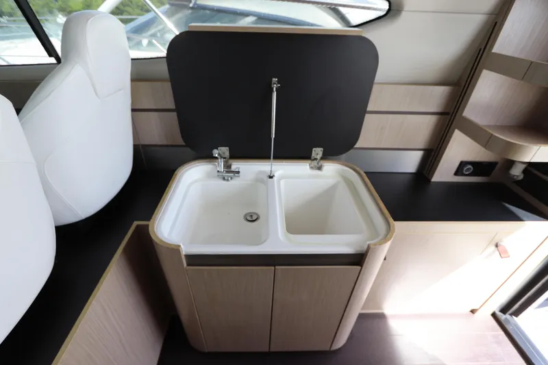 Slide: The Image of Modern kitchen sink in 2020 Azimut Nexus X47 yacht interior. - 18