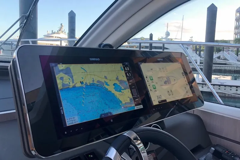 Slide: The Image of Cockpit of 2020 Azimut Nexus X47 yacht with dual Simrad navigation displays. - 21