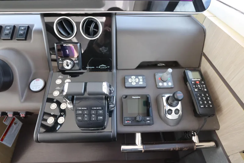 Slide: The Image of Control panel of 2020 Azimut Nexus X47 yacht with advanced navigation equipment. - 23