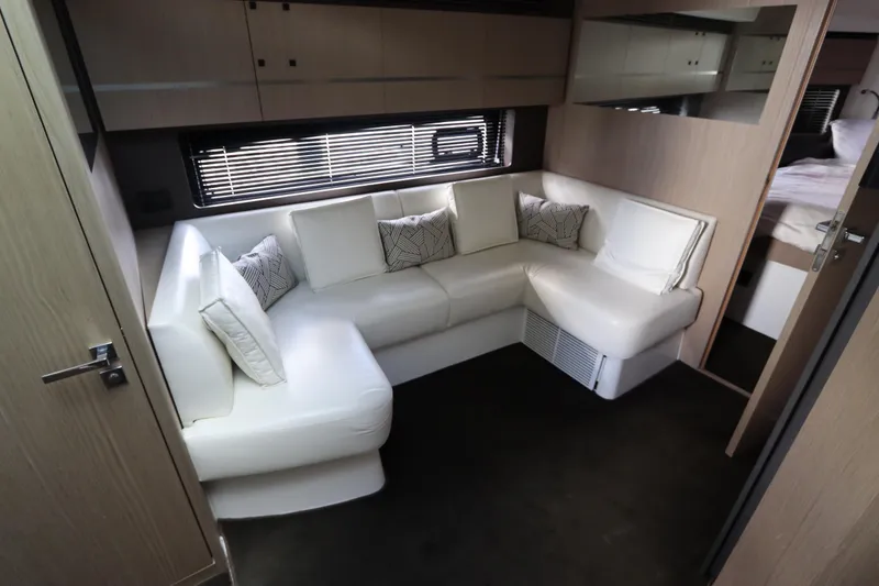 Slide: The Image of Luxurious interior of 2020 Azimut Nexus X47 yacht with white leather seating. - 25