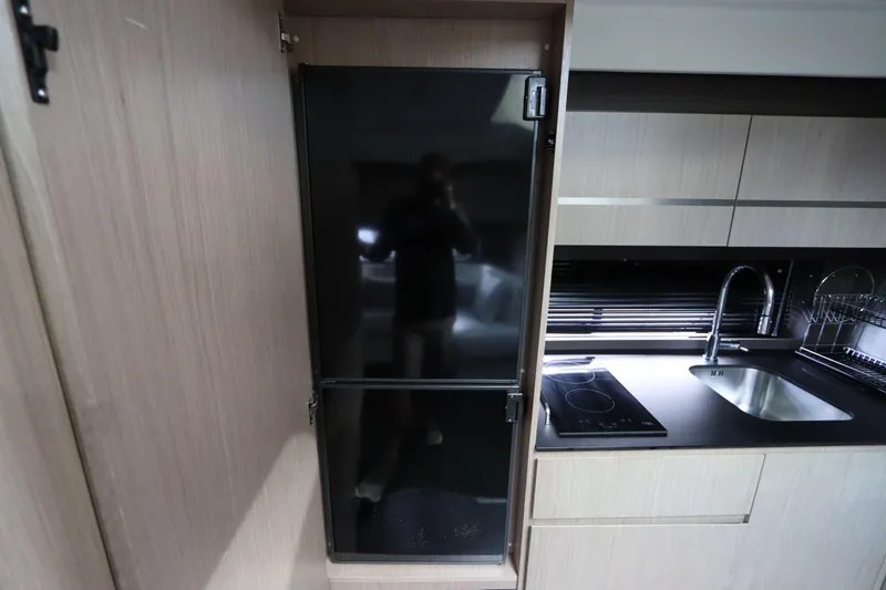 Slide: The Image of Modern kitchen interior of 2020 Azimut Nexus X47 yacht with sleek appliances. - 27