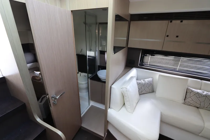 Slide: The Image of Luxurious interior of 2020 Azimut Nexus X47 yacht with modern bathroom and seating area. - 34