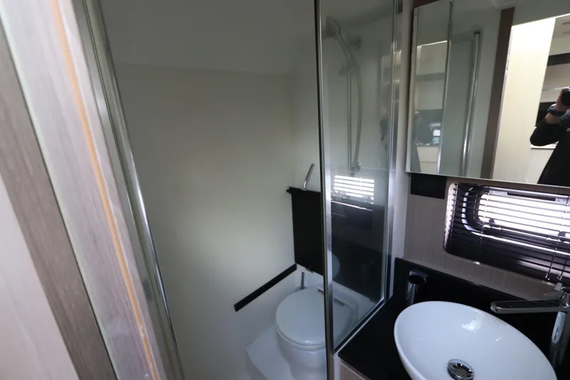 Slide: The Image of Bathroom interior of 2020 Azimut Nexus X47 yacht with modern fixtures and compact design. - 36