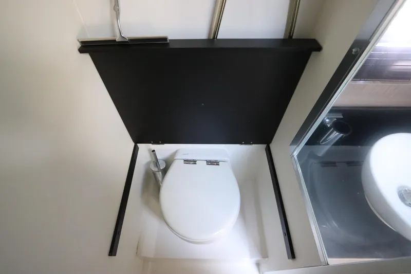 Slide: The Image of Modern bathroom in 2020 Azimut Nexus X47 yacht, featuring sleek toilet design. - 37