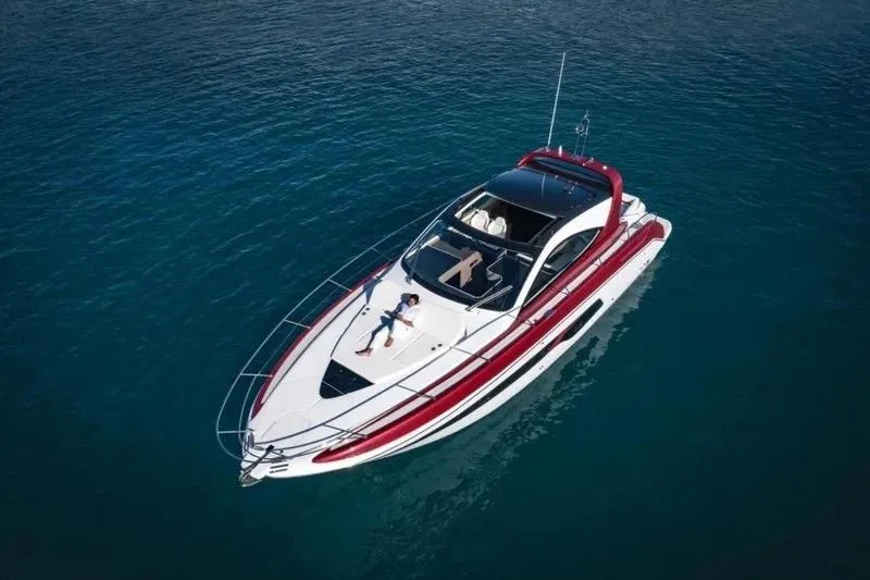 Slide: The Image of 2020 Azimut Nexus X47 luxury yacht cruising on clear blue water. - 41