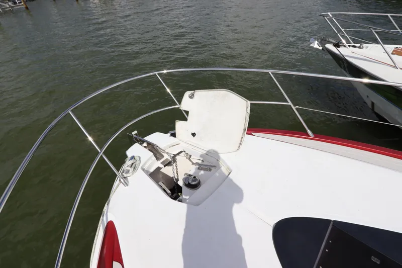 Slide: The Image of Bow of 2020 Azimut Nexus X47 yacht with anchor and railing on water. - 9
