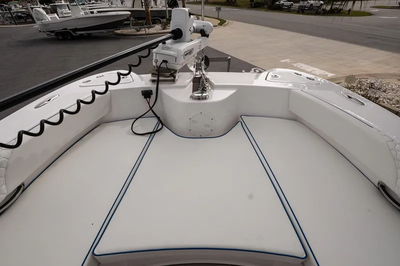 Slide: The Image of 2025 Twin Vee 240 GFX CC boat deck with seating and trolling motor. - 20
