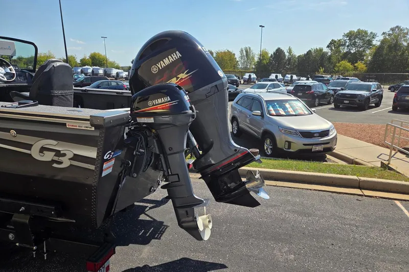 Slide: The Image of 2022 G3 boat on trailer in parking lot, sunny day, license WS 1528 VN. - 4