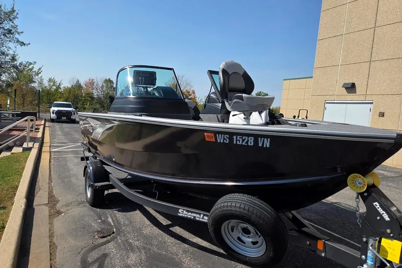Slide: The Image of 2022 G3 boat with Yamaha engines in a parking lot. - 5