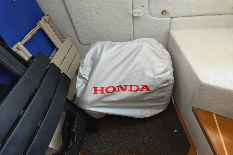 Slide: The Image of Honda generator covered, inside 2015 Cutwater C28 boat cabin. - 25
