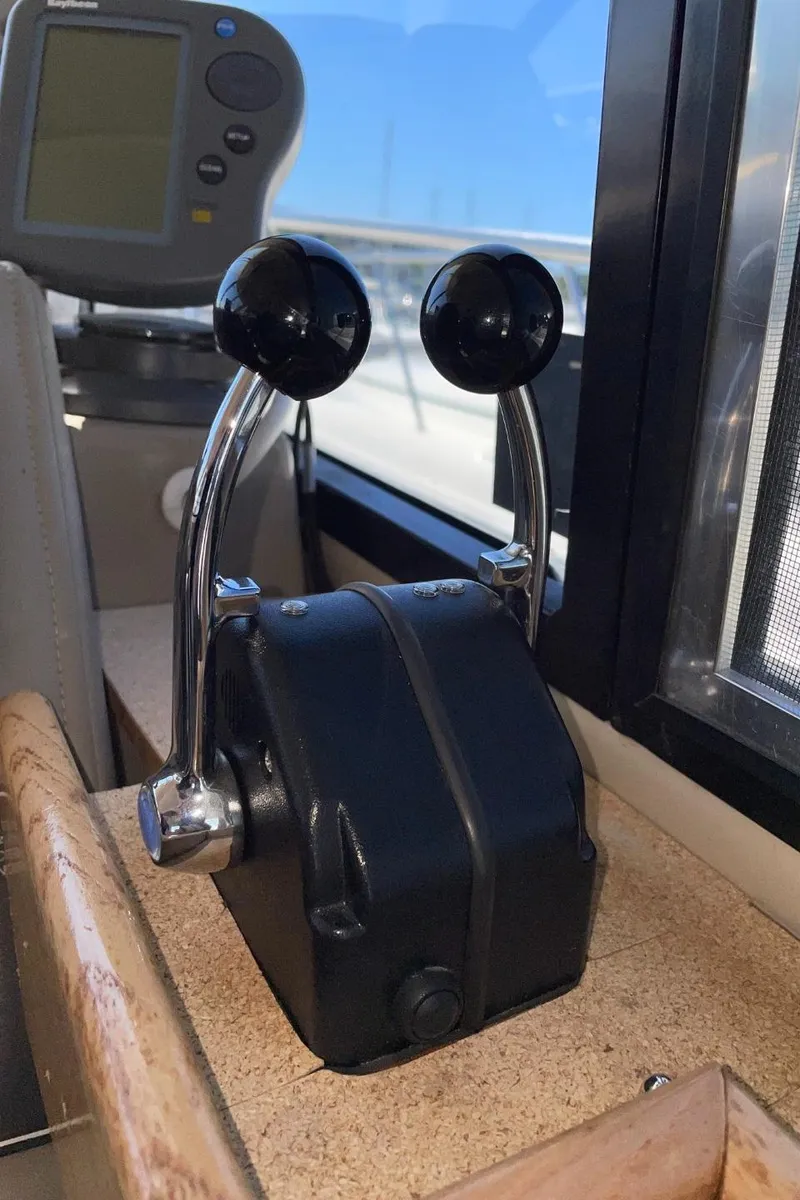 Slide: The Image of Dual throttle controls on a 1999 Bayliner 3388 Motoryacht. - 25