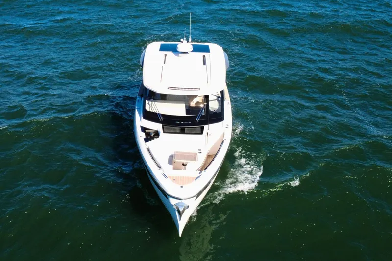 Slide: The Image of 2025 Saxdor 400 GTO cruising on open water, aerial view. - 13